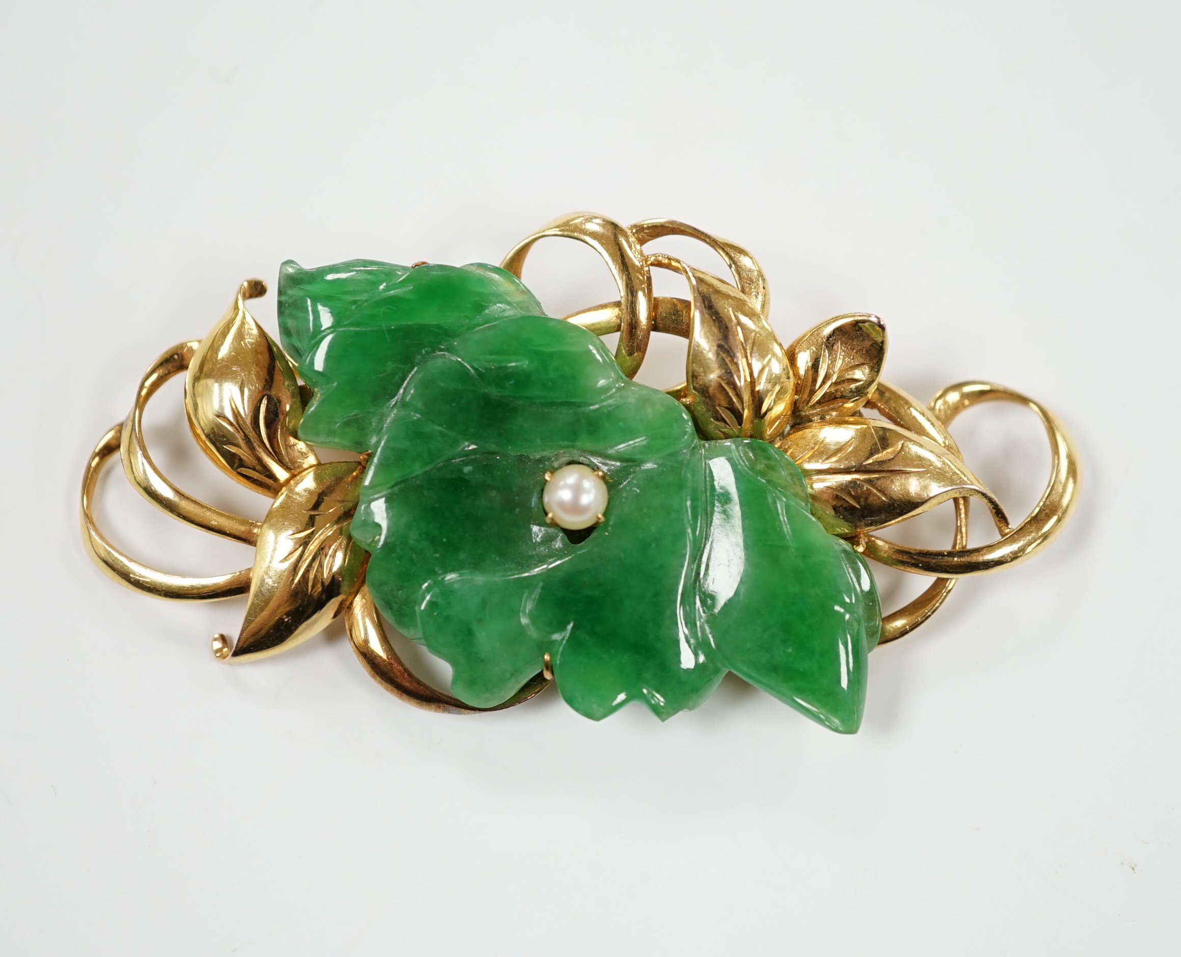 A 14k yellow metal, carved jade and seed pearl mounted floral spray brooch, 57mm